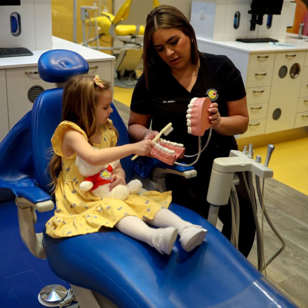 calgary-pediatric-dentist-girl-smiling-checkup