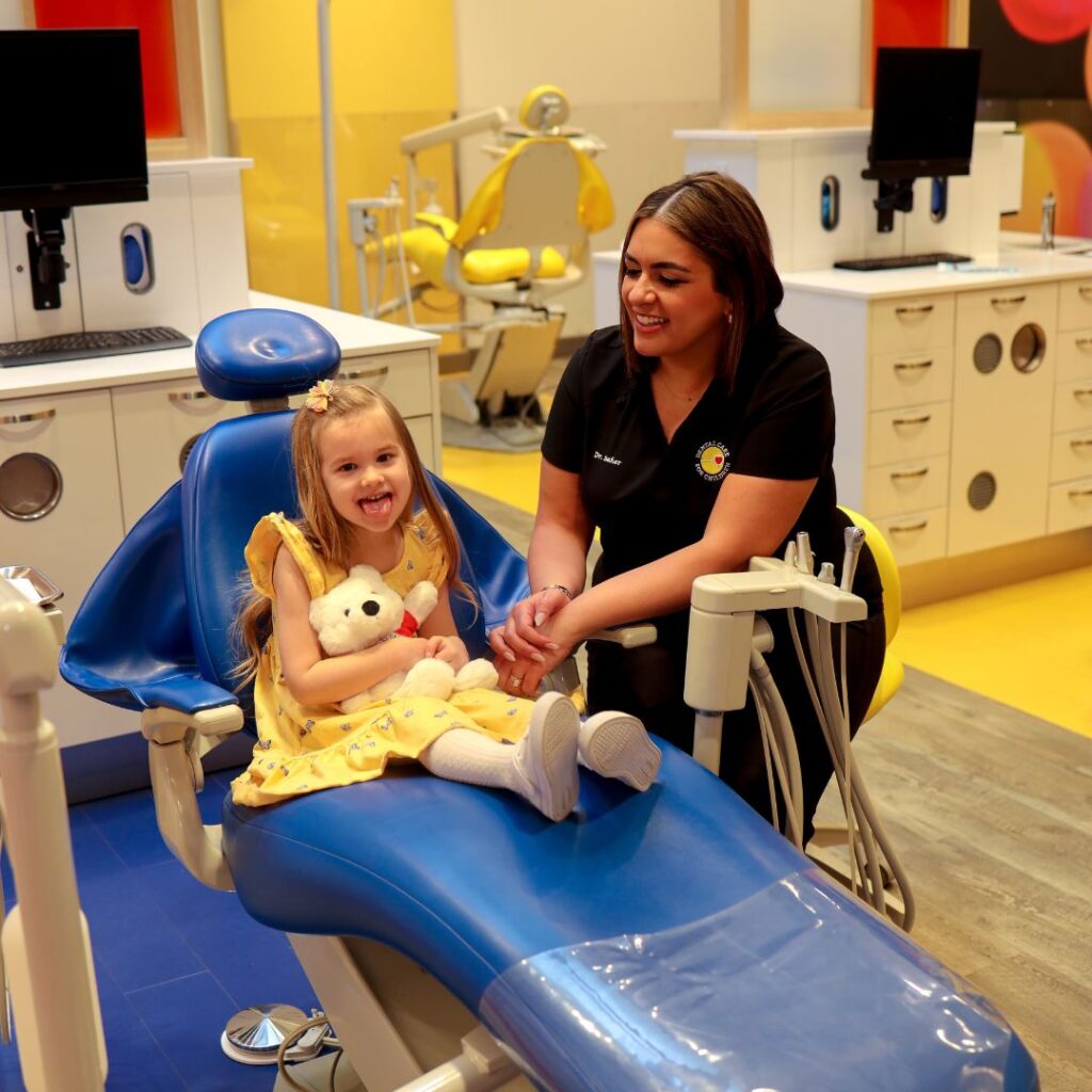 child-with-dental-model-learning-brushing