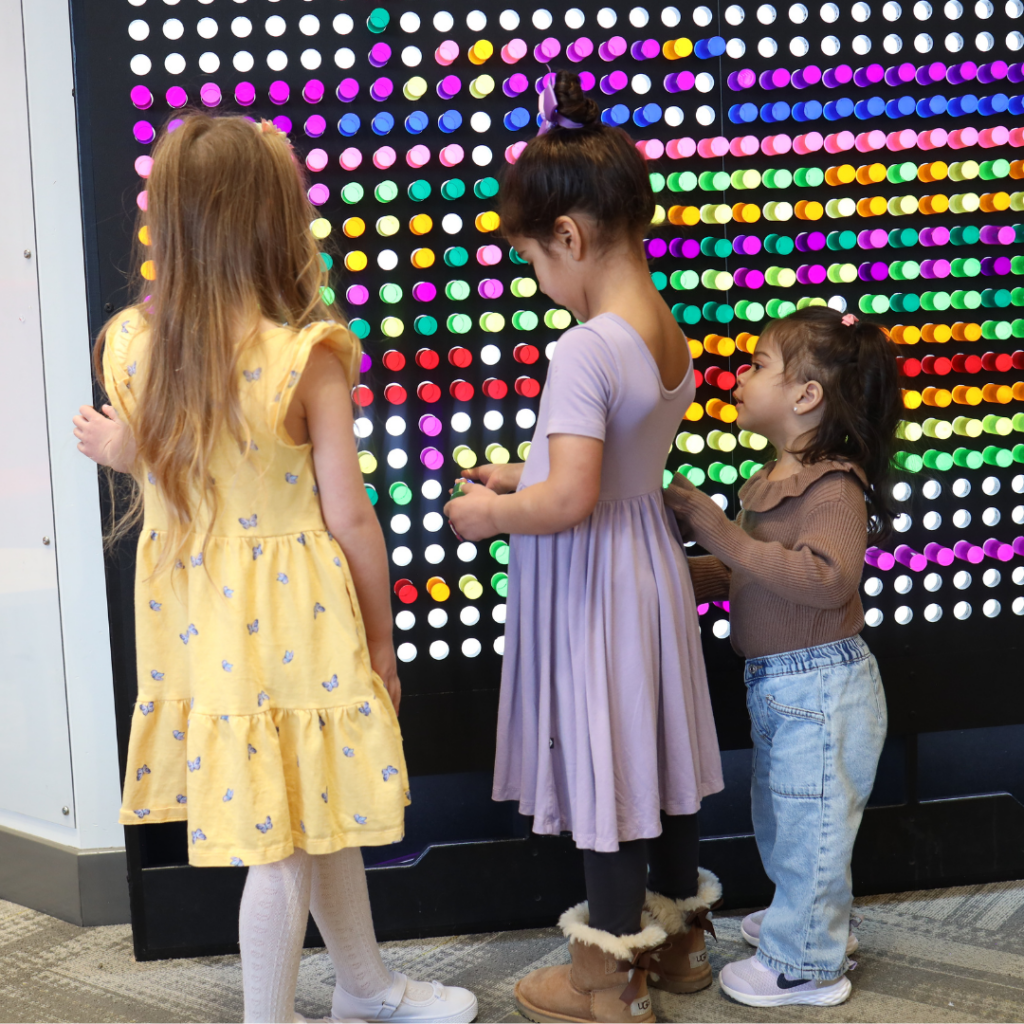 girls-playing-dcfc-litebrite